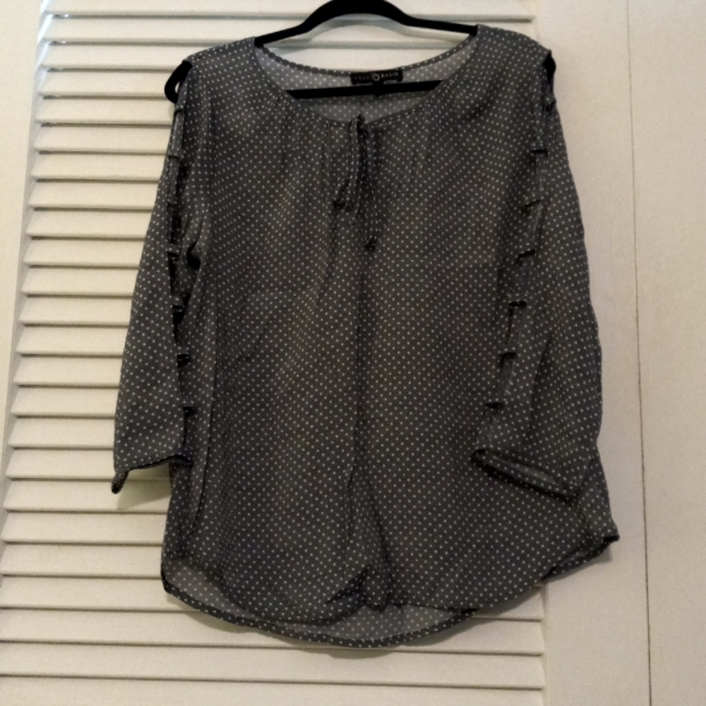 Bare arm polka dot blouse